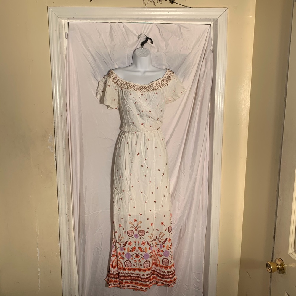 Women orange and white dress.